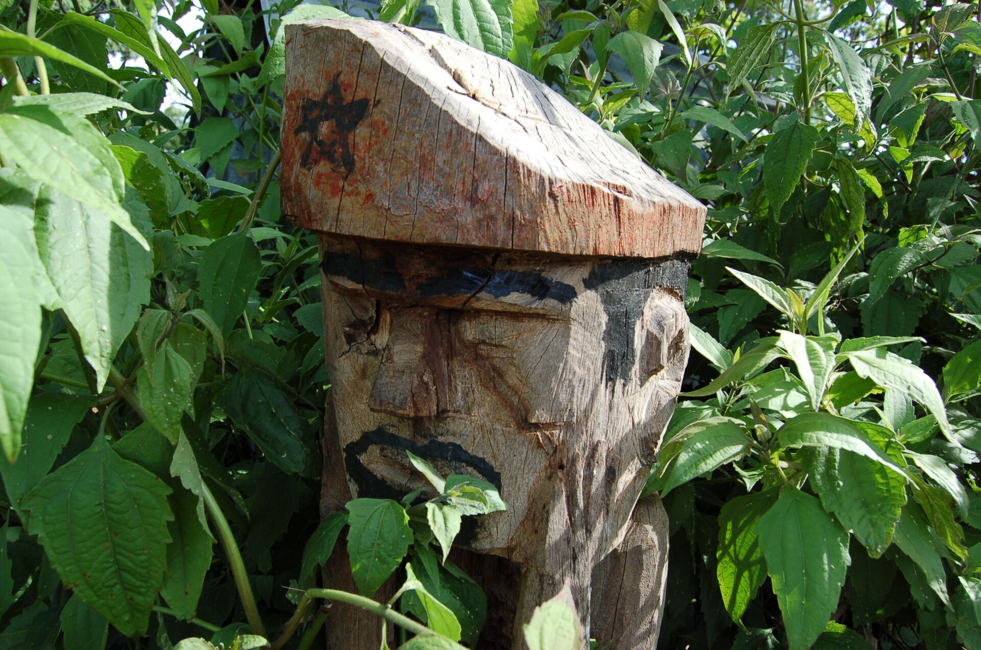A carved wooden figure from a Jarai tomb